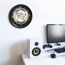Load image into Gallery viewer, Wake Forest Demon Deacons: Ribbed Frame Wall Clock - The Fan-Brand