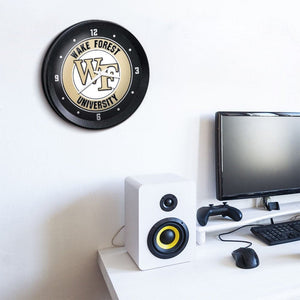 Wake Forest Demon Deacons: Ribbed Frame Wall Clock - The Fan-Brand