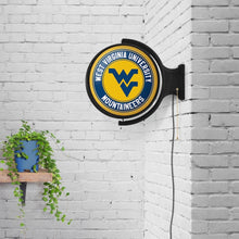 Load image into Gallery viewer, West Virginia Mountaineers: Original Round Rotating Lighted Wall Sign - The Fan-Brand