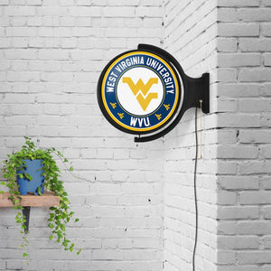 West Virginia Mountaineers: Original Round Rotating Lighted Wall Sign - The Fan-Brand