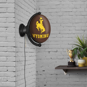 Wyoming Cowboys: Original Oval Rotating Lighted Wall Sign - The Fan-Brand