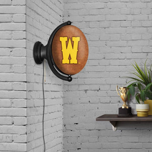 Wyoming Cowboys: W - Original Oval Rotating Lighted Wall Sign - The Fan-Brand