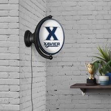 Load image into Gallery viewer, Xavier Musketeers: Original Oval Rotating Lighted Wall Sign - The Fan-Brand