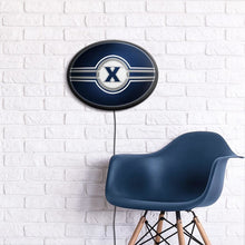 Load image into Gallery viewer, Xavier Musketeers: Oval Slimline Lighted Wall Sign - The Fan-Brand